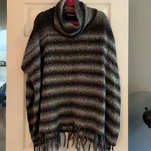 Cowl neck poncho with tassels